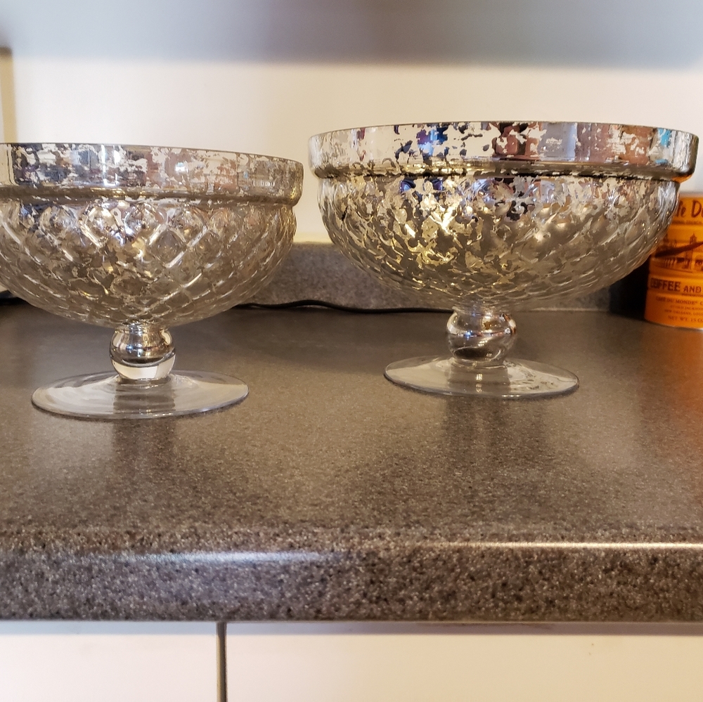 Large and small silver brushed bowls